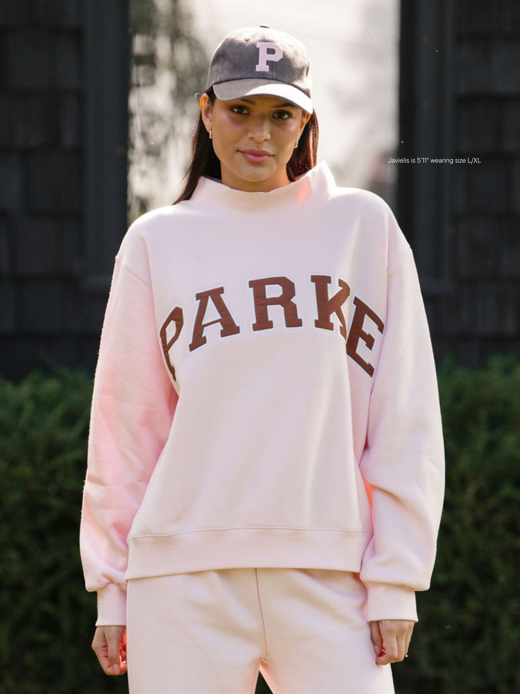 girl wearing hometown varsity mockneck flat -rose + mocha