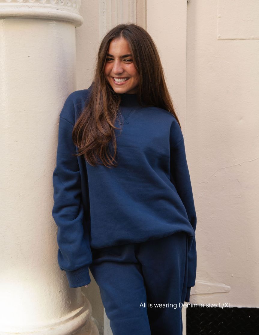 girl wearing classic mockneck -denim