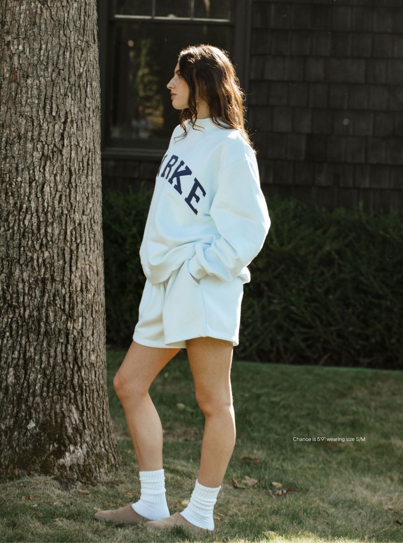 girl wearing Fleece Lounge Sweatshorts -cloud