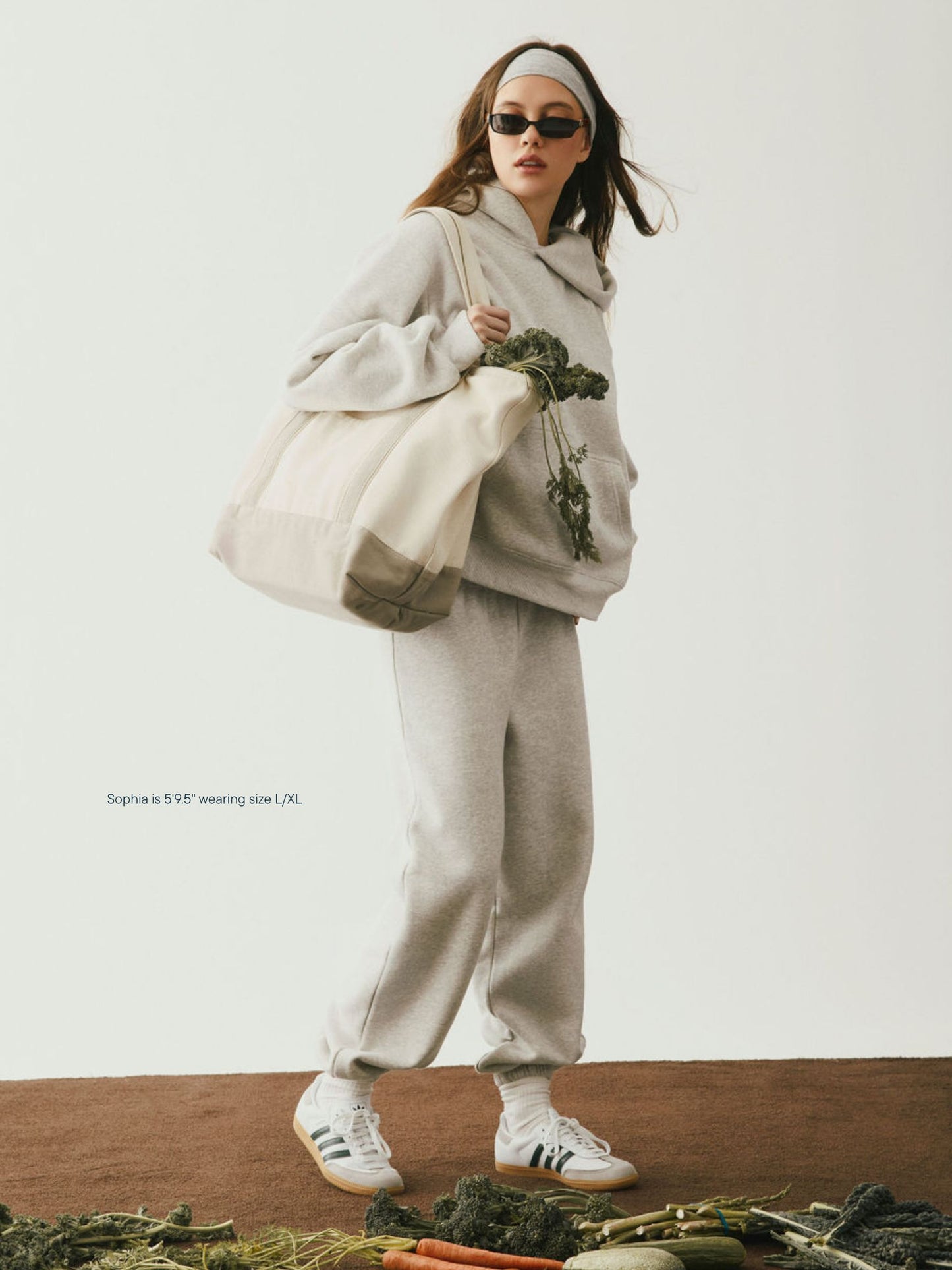 girl wearing Cities Graphic Hoodie -los angeles