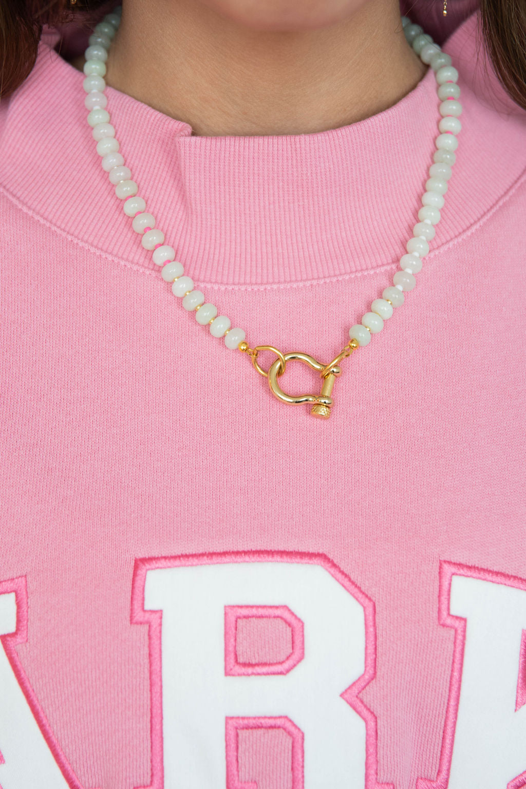 girl wearing spicy dan necklace -matcha