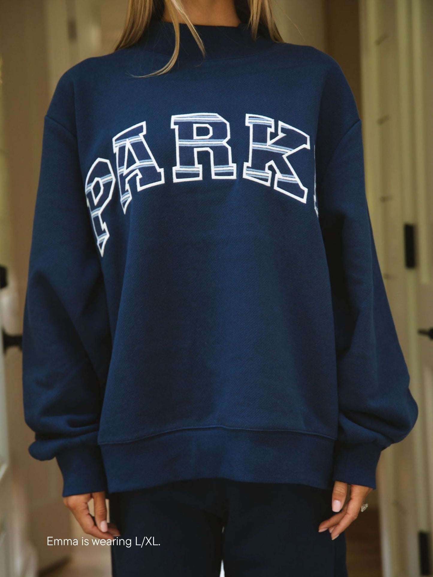 girl wearing Maggie & Emma Heritage Varsity Mockneck -denim