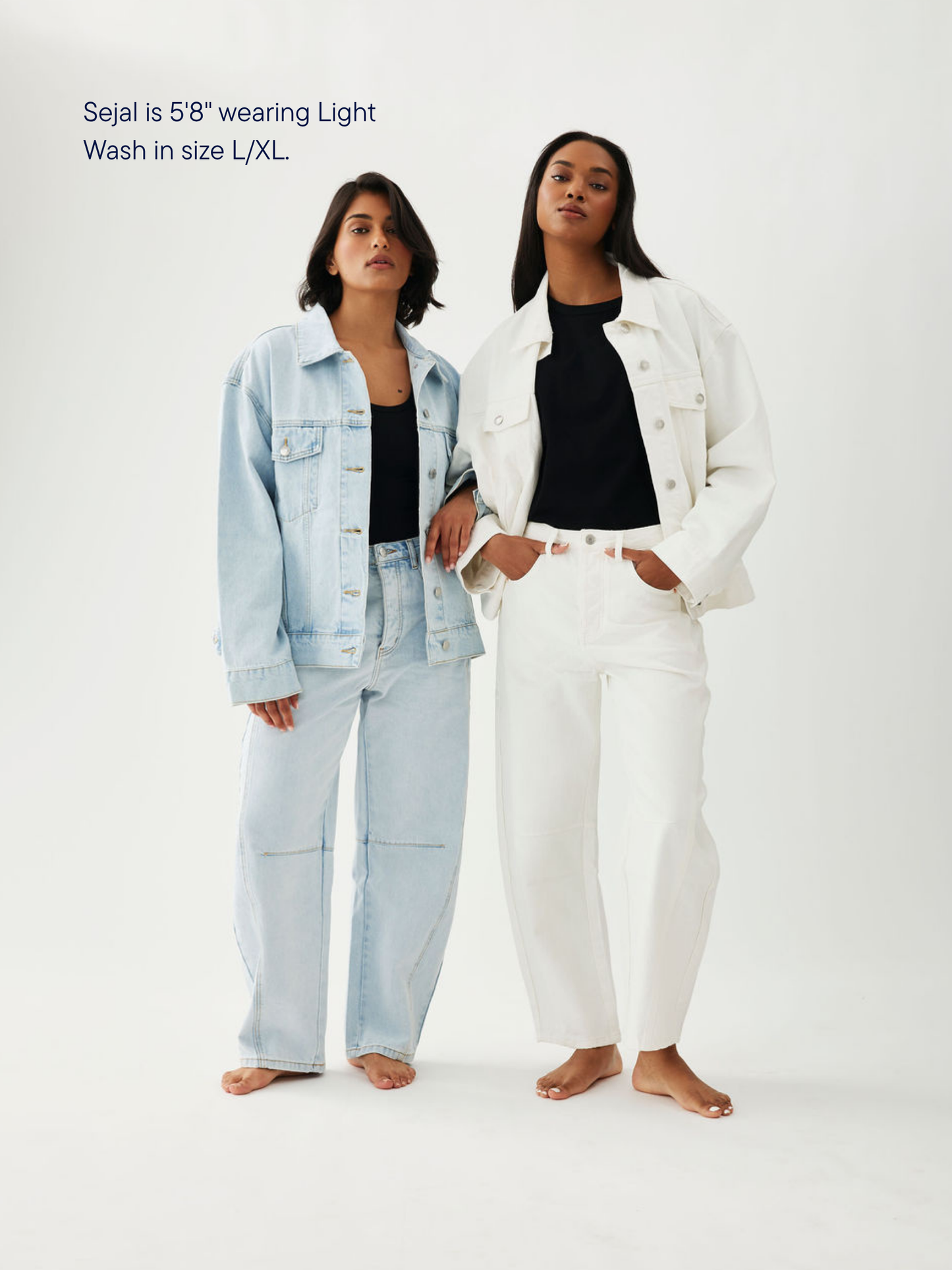 girl wearing oversized denim jacket -light wash