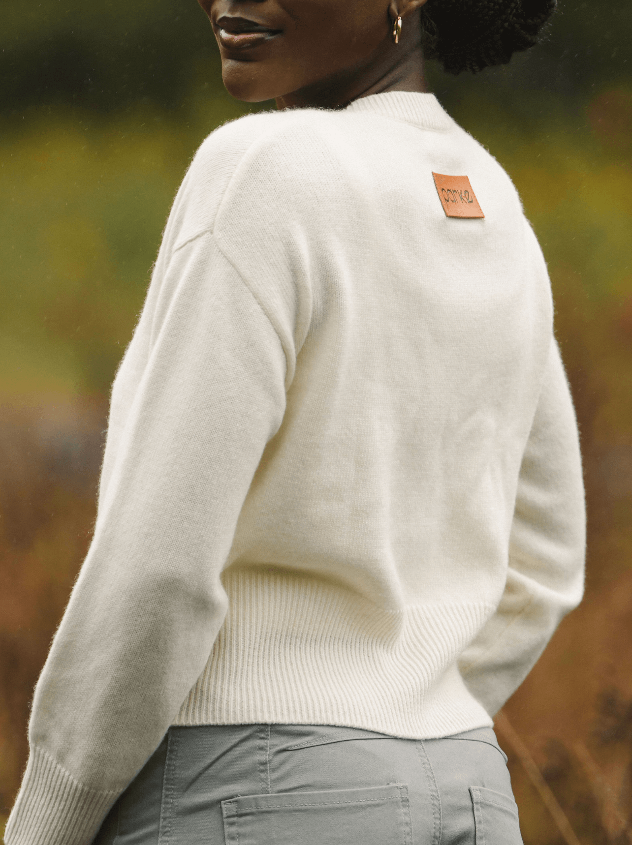 girl wearing cream cardigan -cream