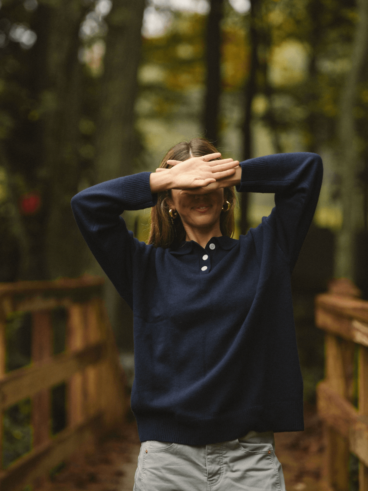 girl wearing navy polo sweater - navy