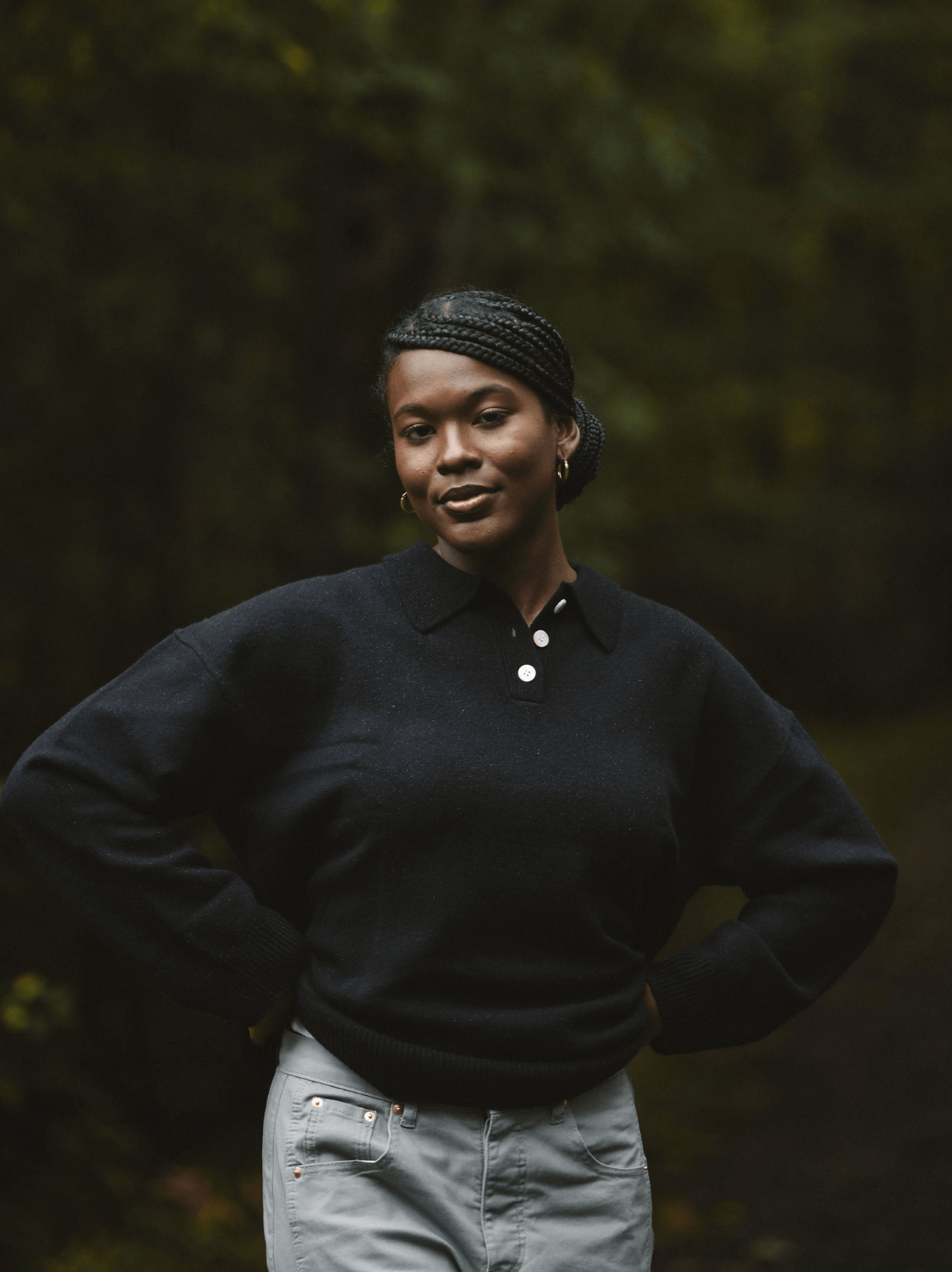 girl wearing black polo sweater - black