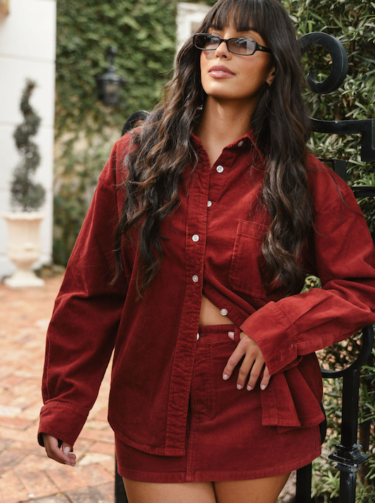 Girl wearing burgundy corduroy mini skirt - burgundy