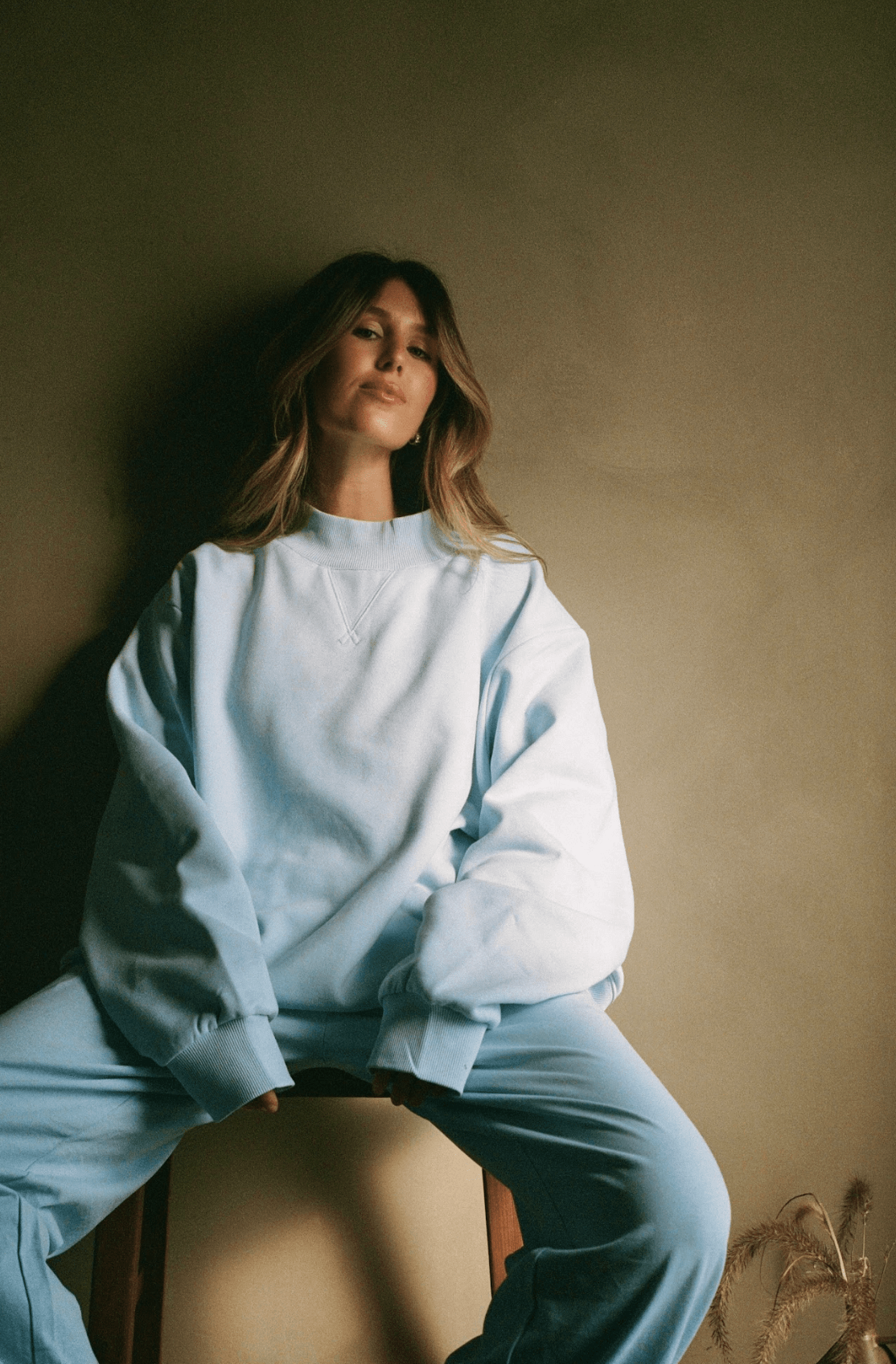 girl wearing ice classic mockneck - ice