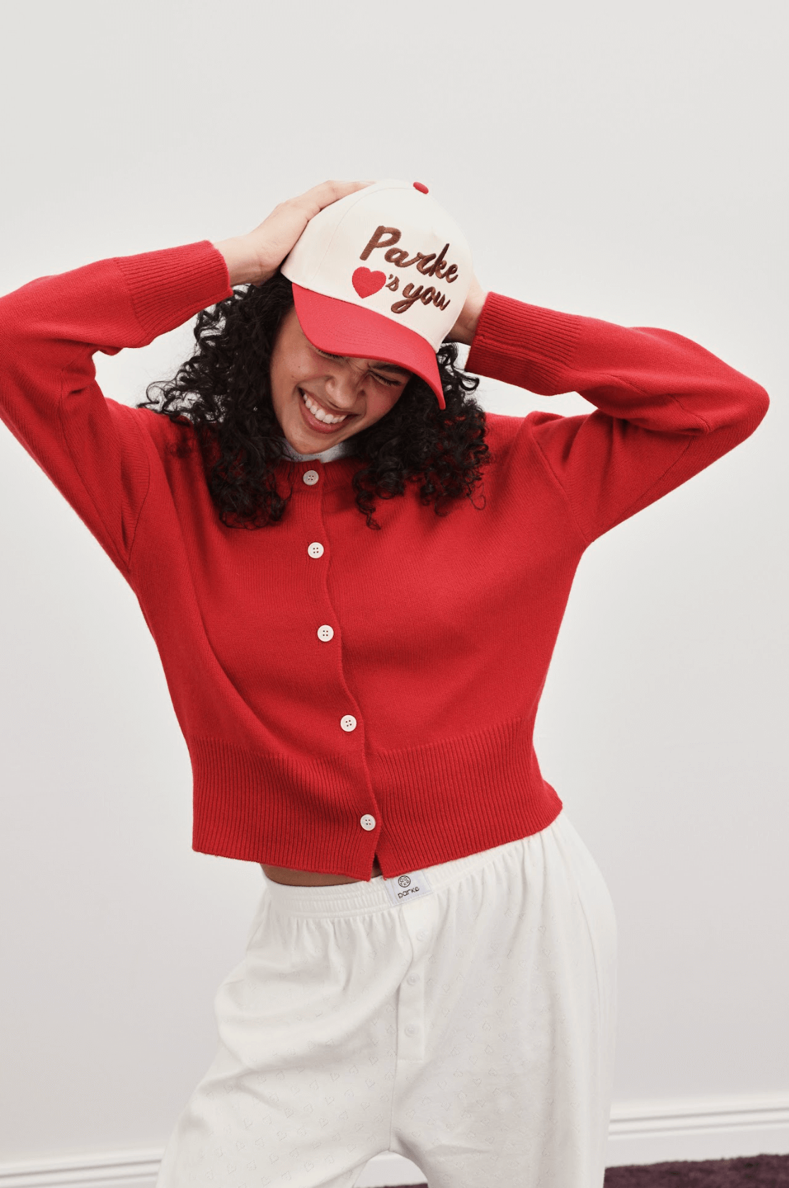 girl wearing ruby cardigan -ruby