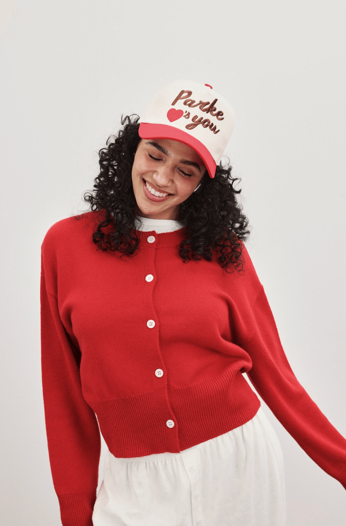 girl wearing ruby cardigan -ruby