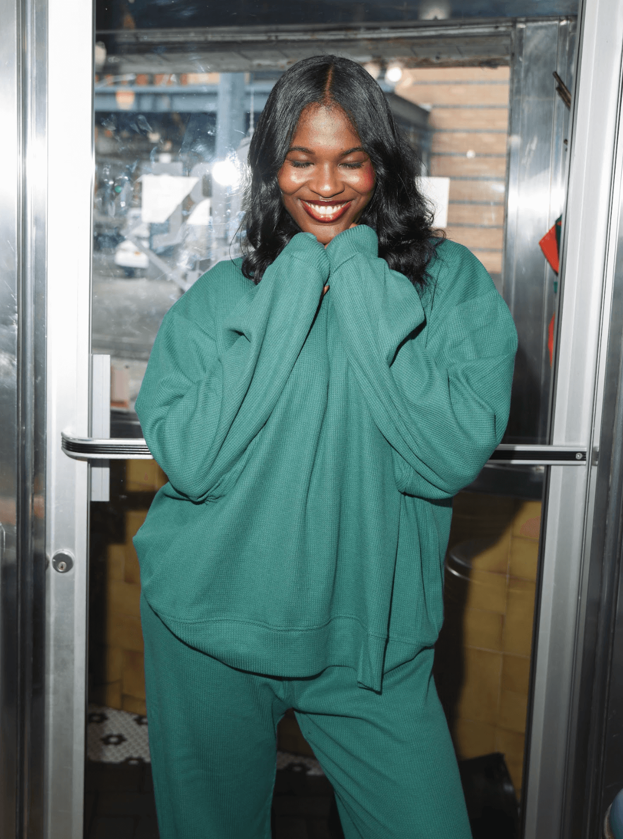 girl wearing waffle mockneck -evergreen