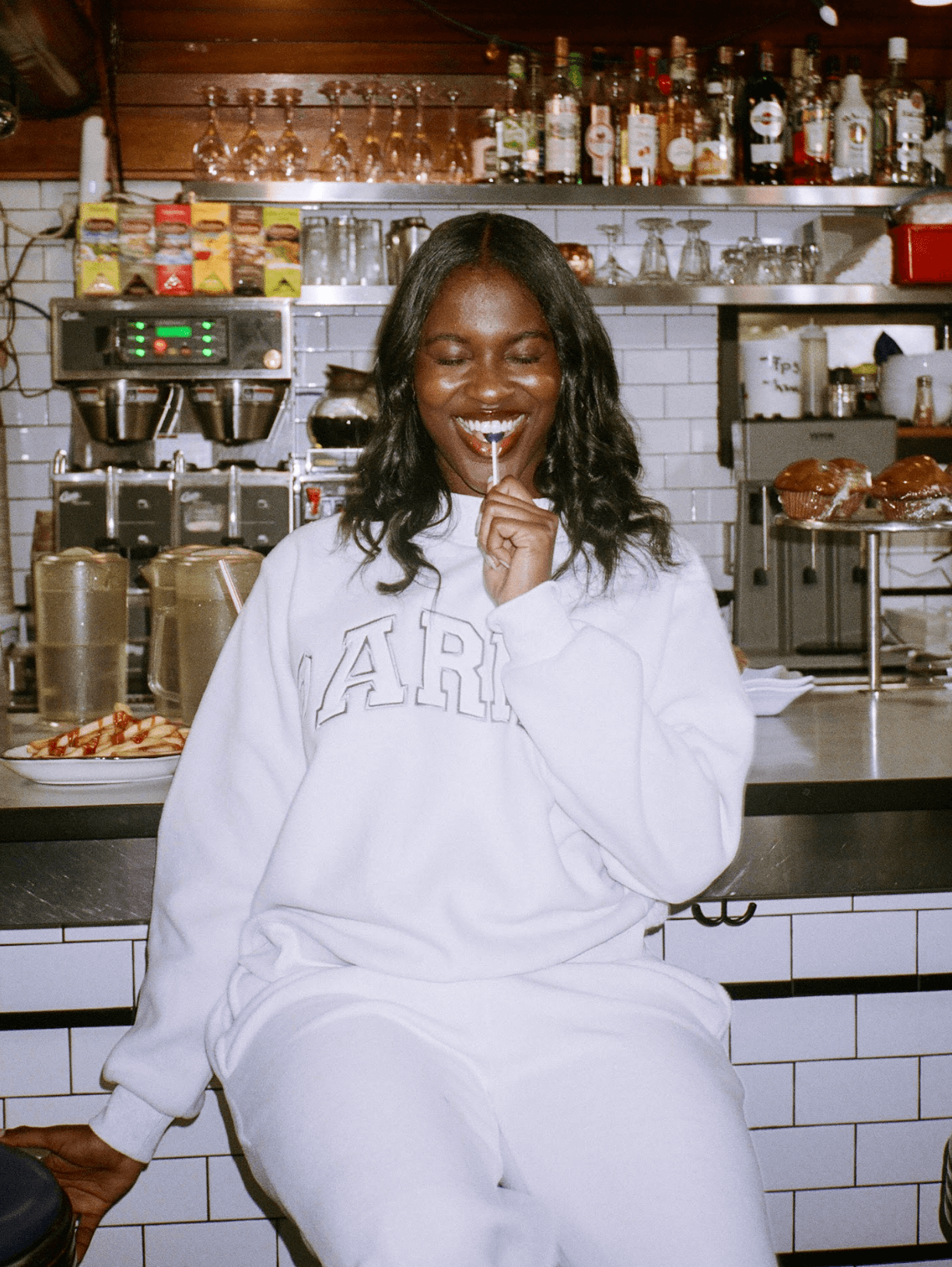 girl wearing inside out mockneck -heather grey