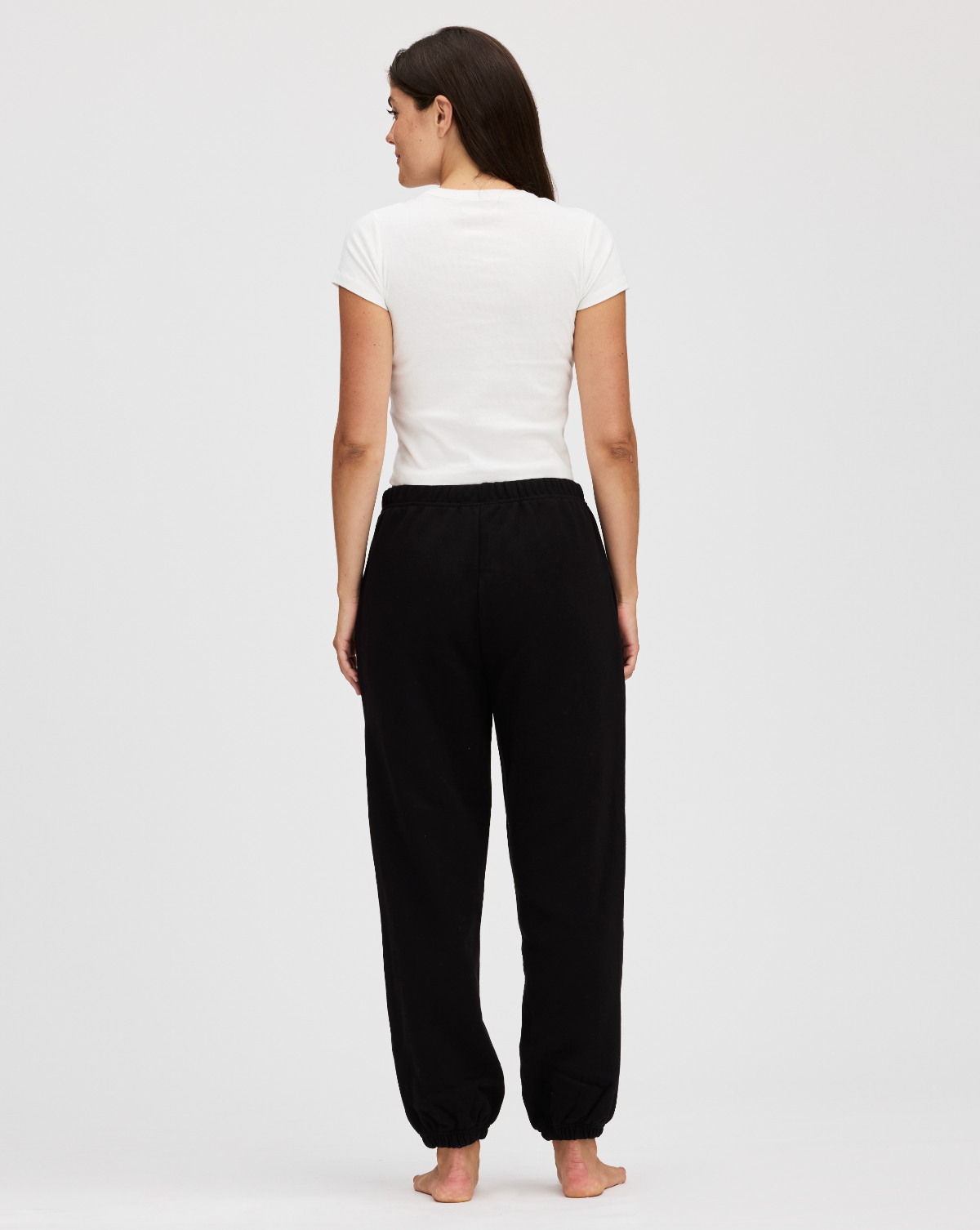 model wearing unisex sweats -black