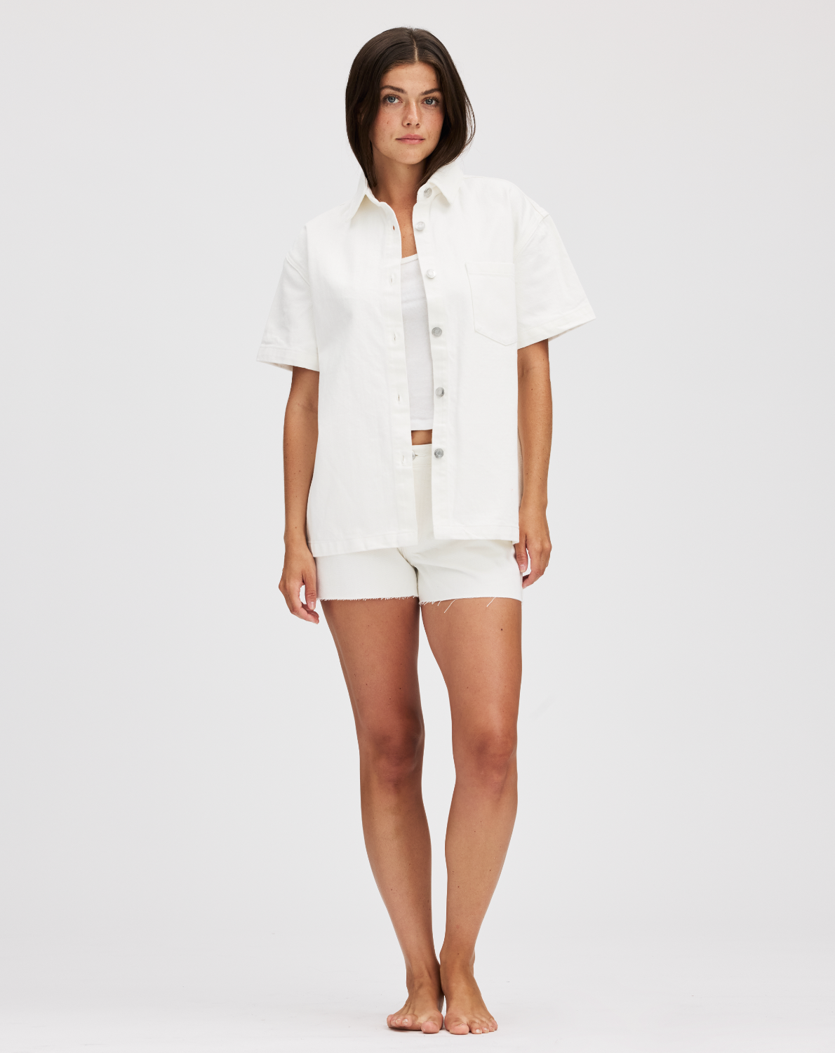 model wearing short sleeve denim shirt - white