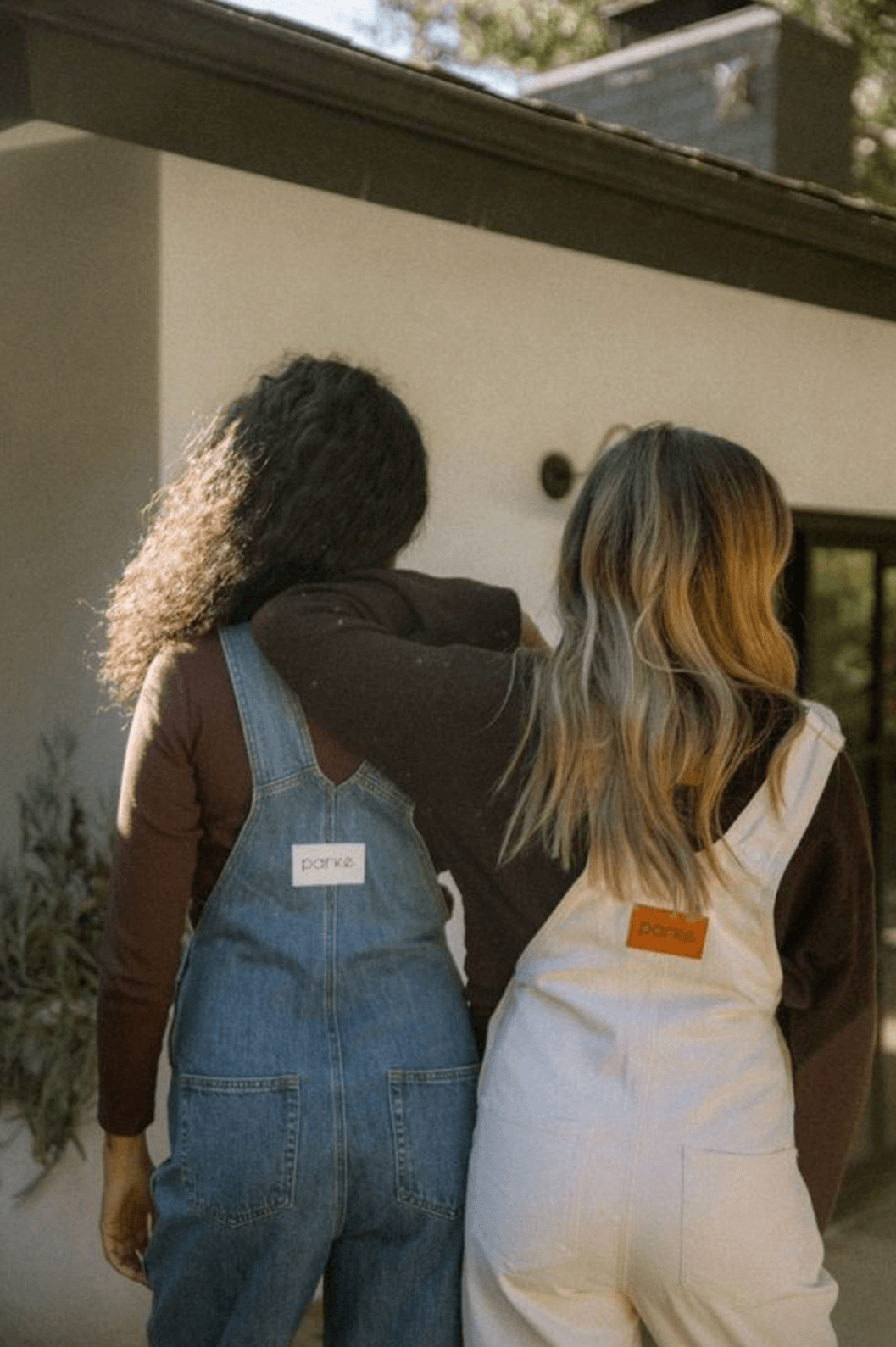 girl wearing cream overalls - cream
