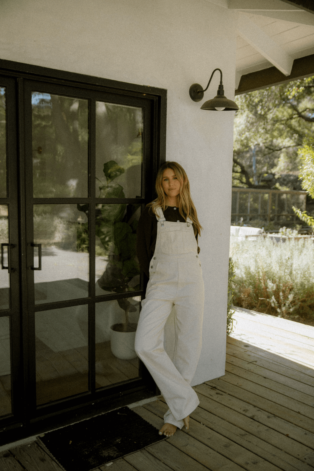 girl wearing cream overalls - cream
