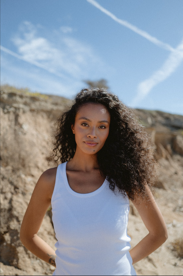 Close up image of model wearing white classic tank - white