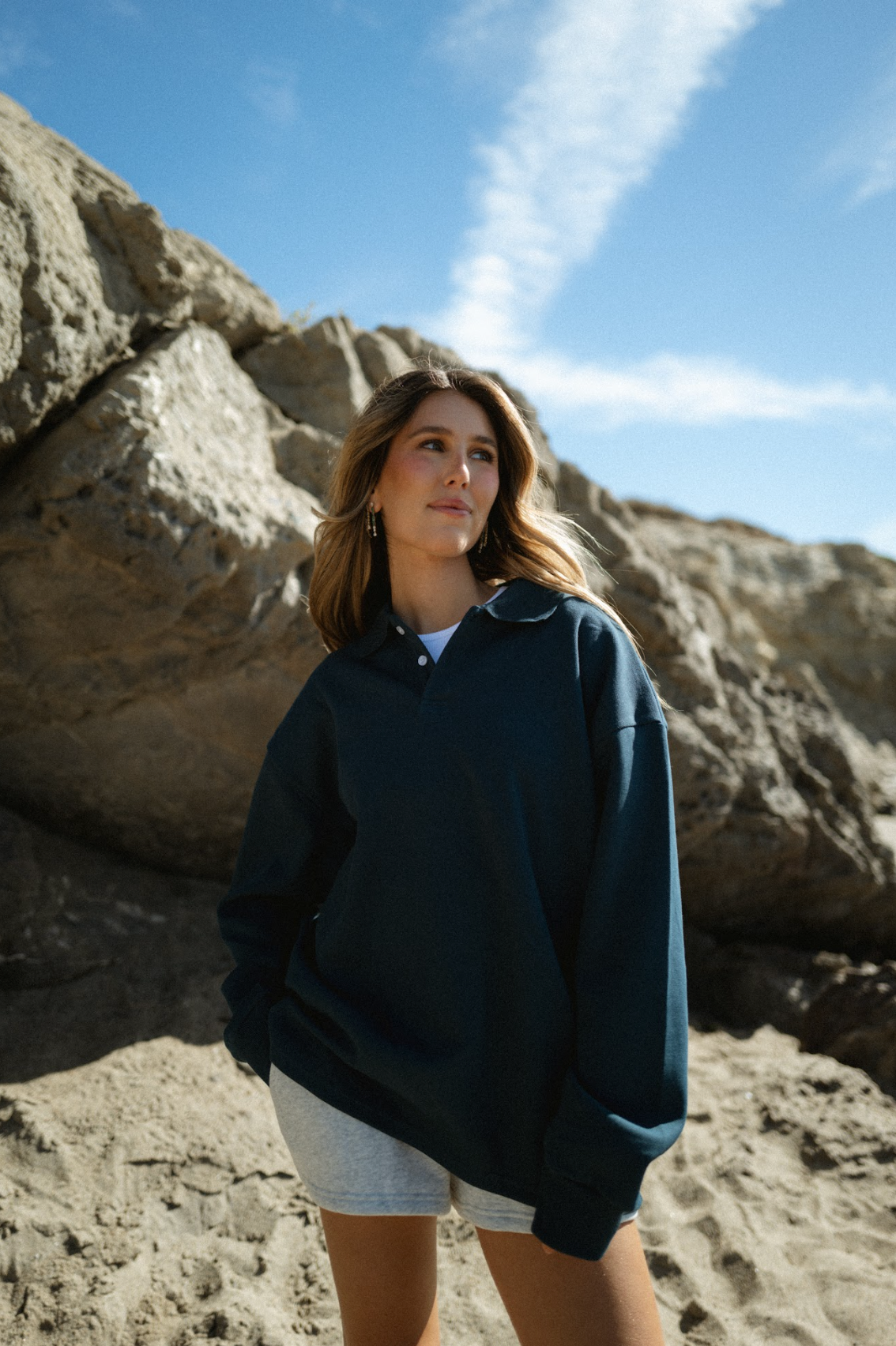 girl wearing long sleeve polo- reef