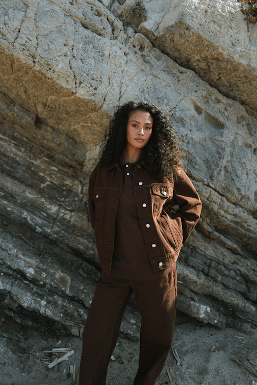 girl wearing chocolate oversized jean jacket -chocolate