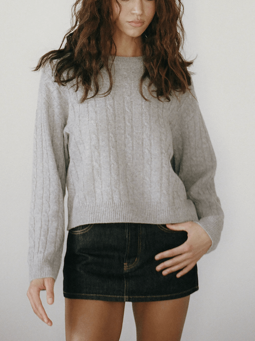 girl wearing dark wash denim mini skirt -dark wash