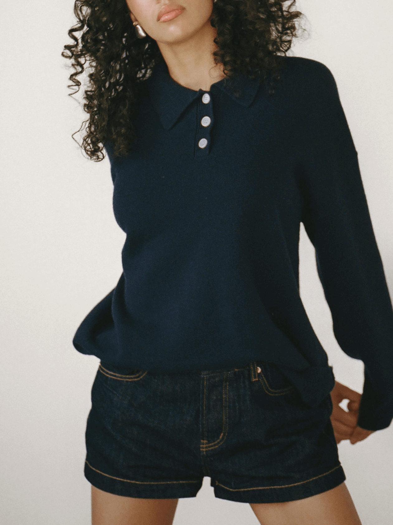 girl wearing navy polo sweater - navy