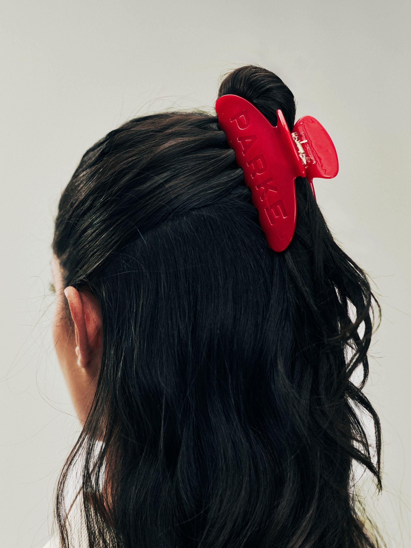 girl wearing Holiday Claw Clip -crimson