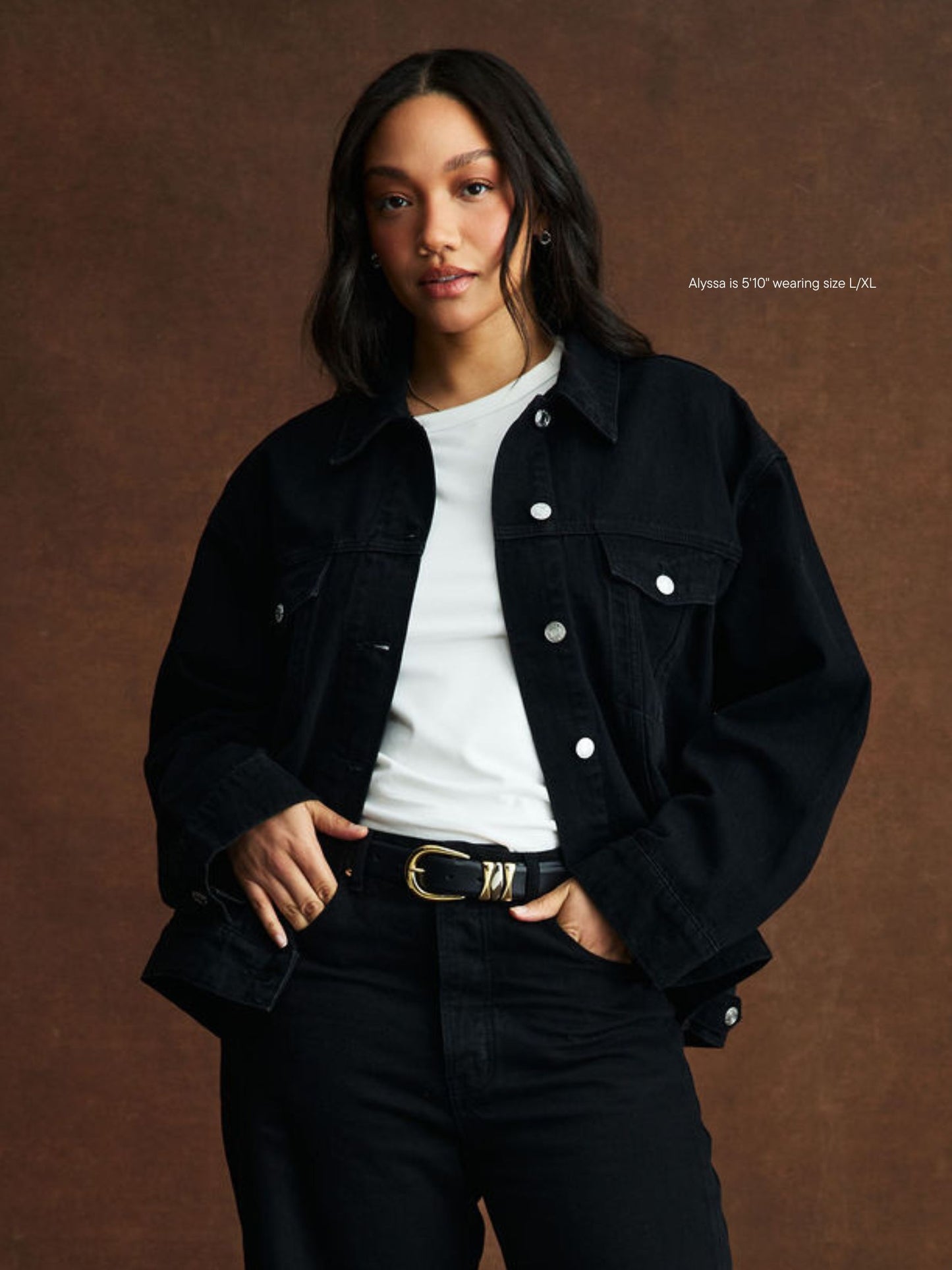 girl wearing oversized jean jacket -black