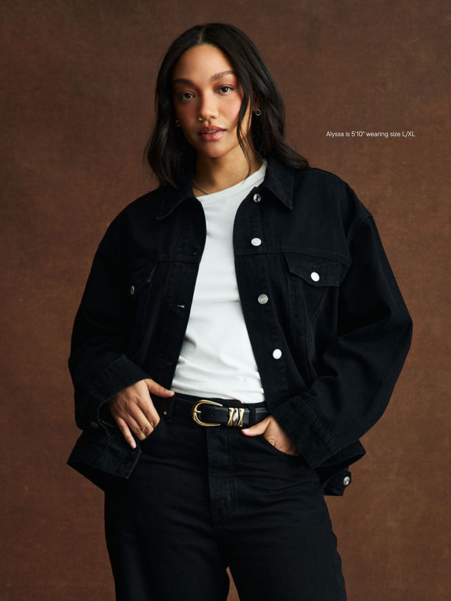 girl wearing oversized jean jacket -black