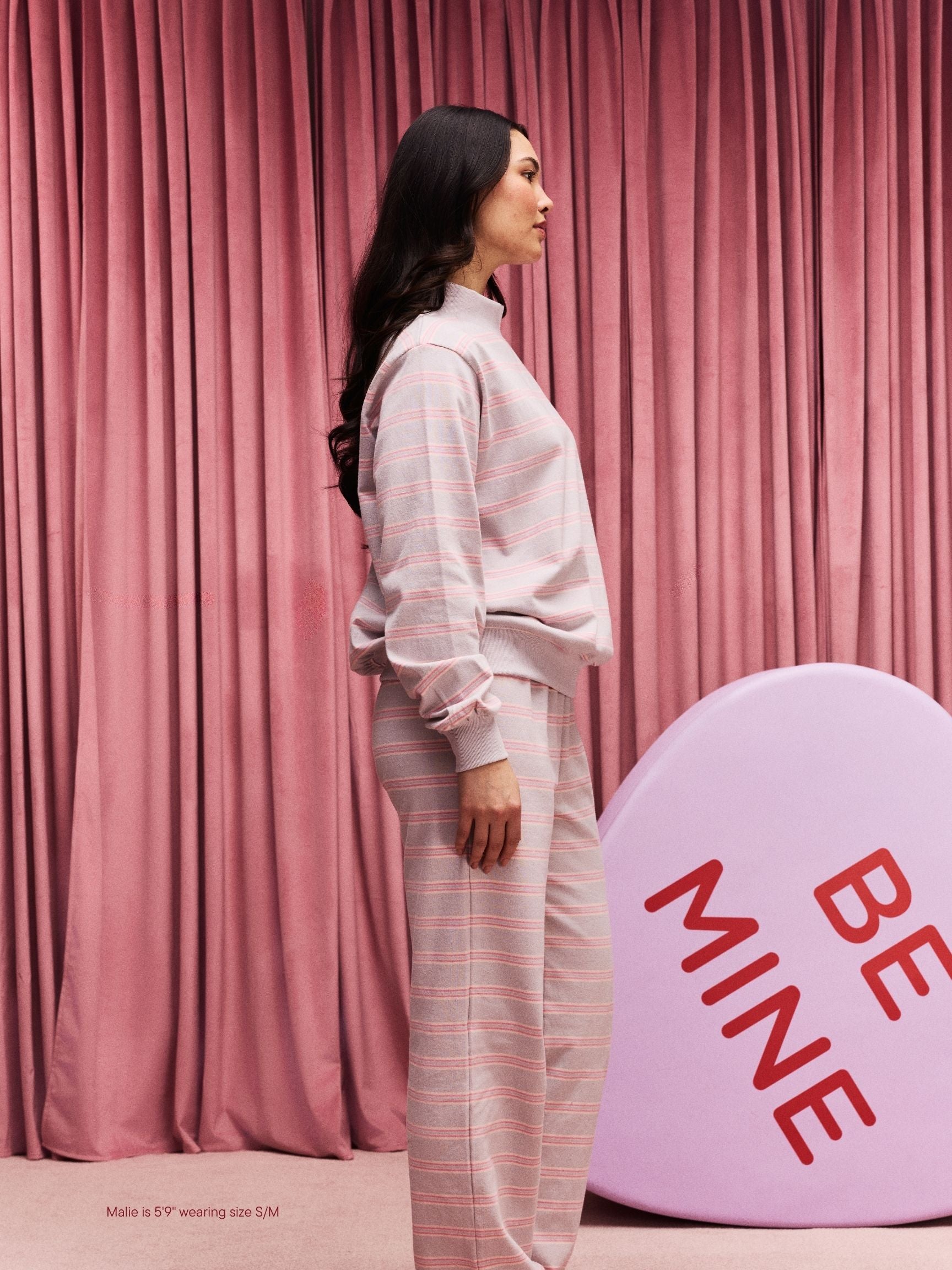 girl wearing Striped Mockneck Pullover -darling stripe