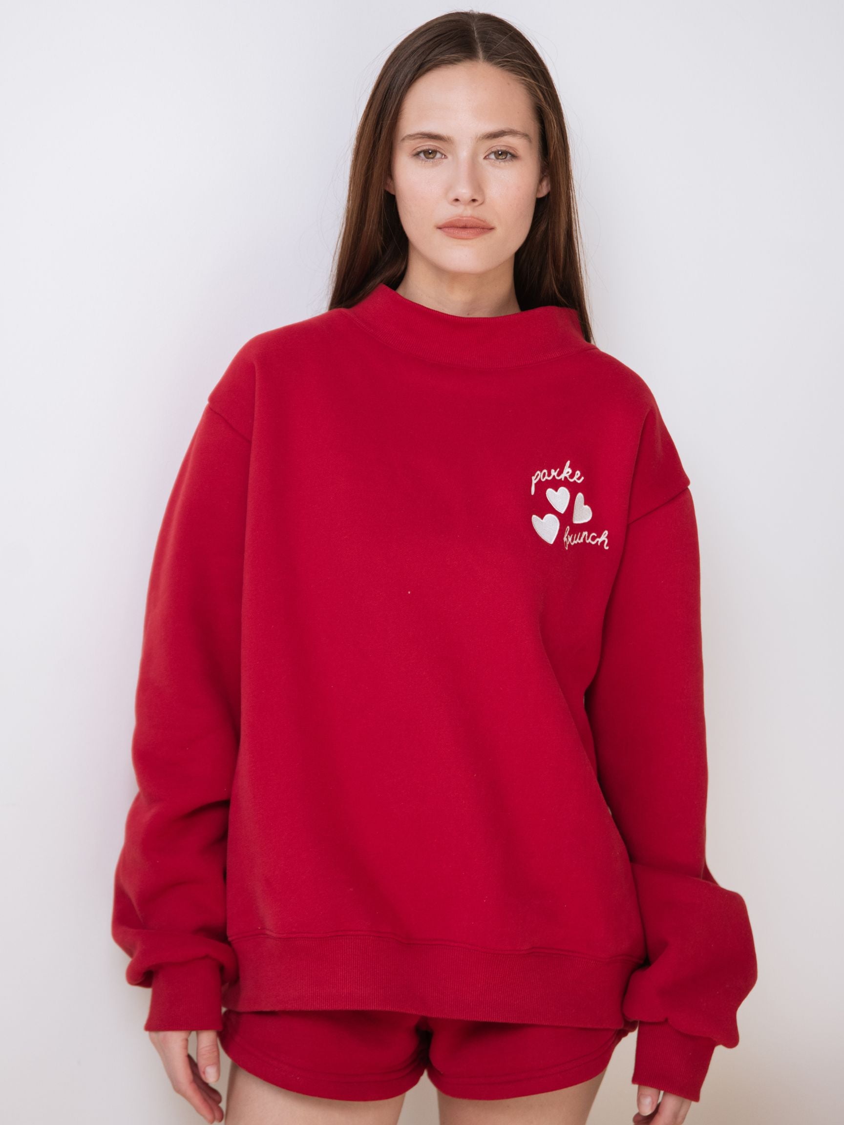 girl wearing Brunch Mockneck -red