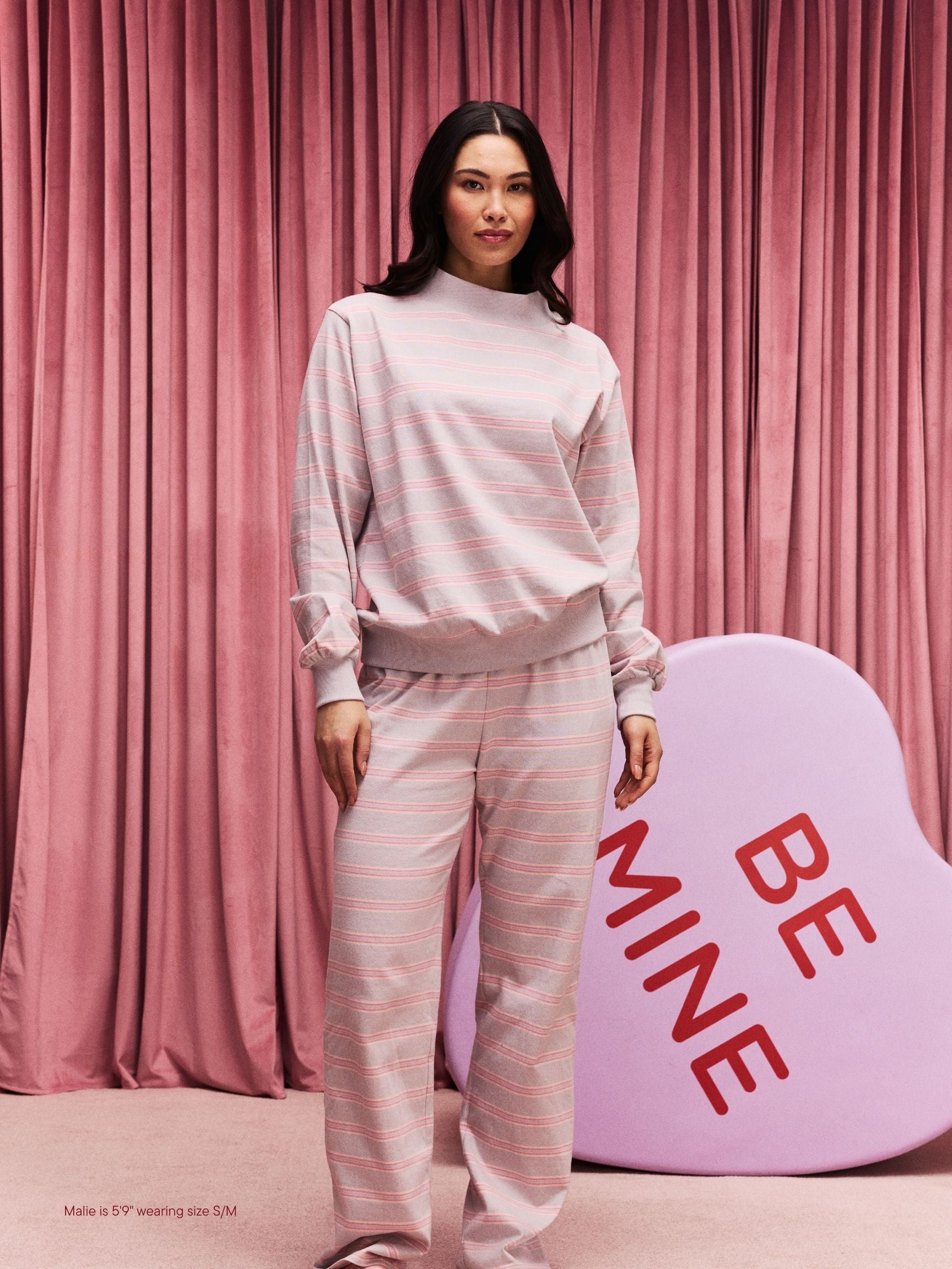 girl wearing Striped Mockneck Pullover -darling stripe