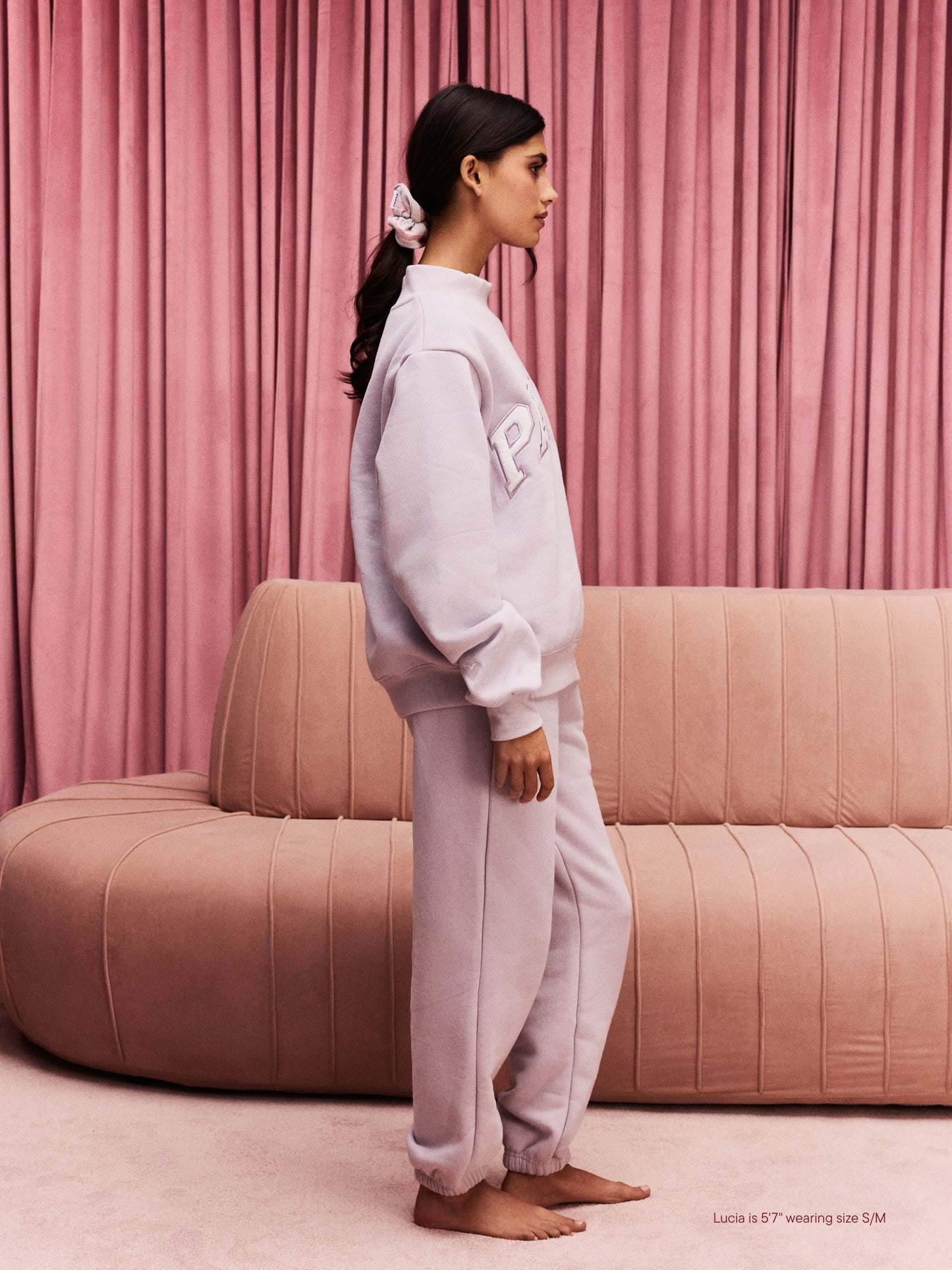 girl wearing Drawstring Unisex Sweatpants -lavender