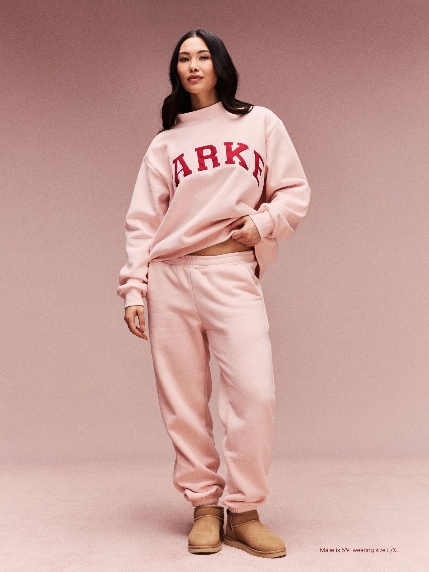 girl wearing Drawstring Unisex Sweatpants -peony