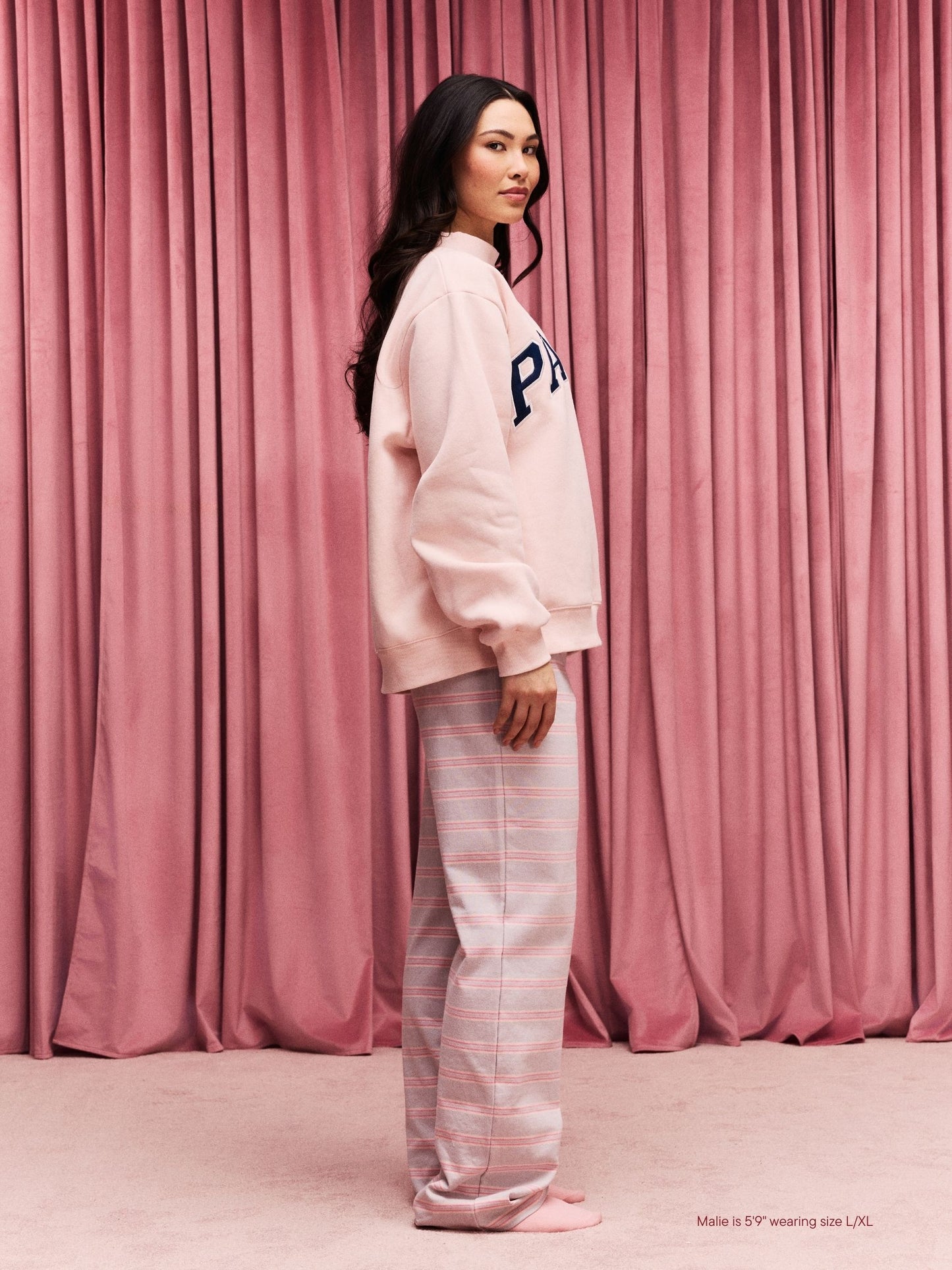 girl wearing Heart Varsity Mockneck -peony + denim