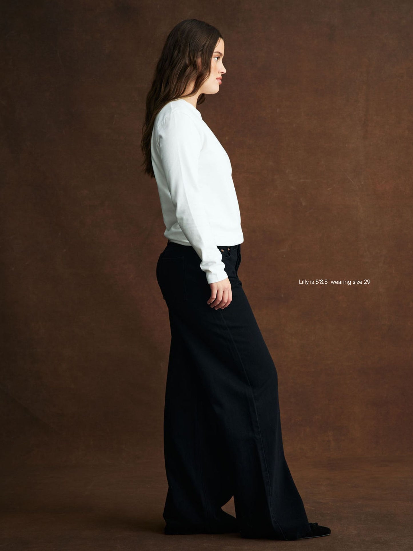 girl wearing Low Rise Baggy Jeans -black