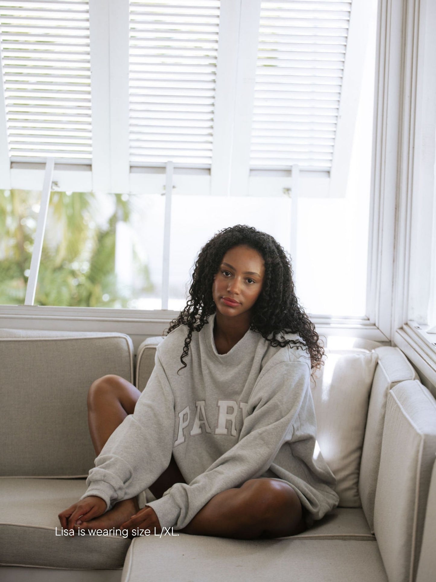 girl wearing varsity mockneck -classic grey + white