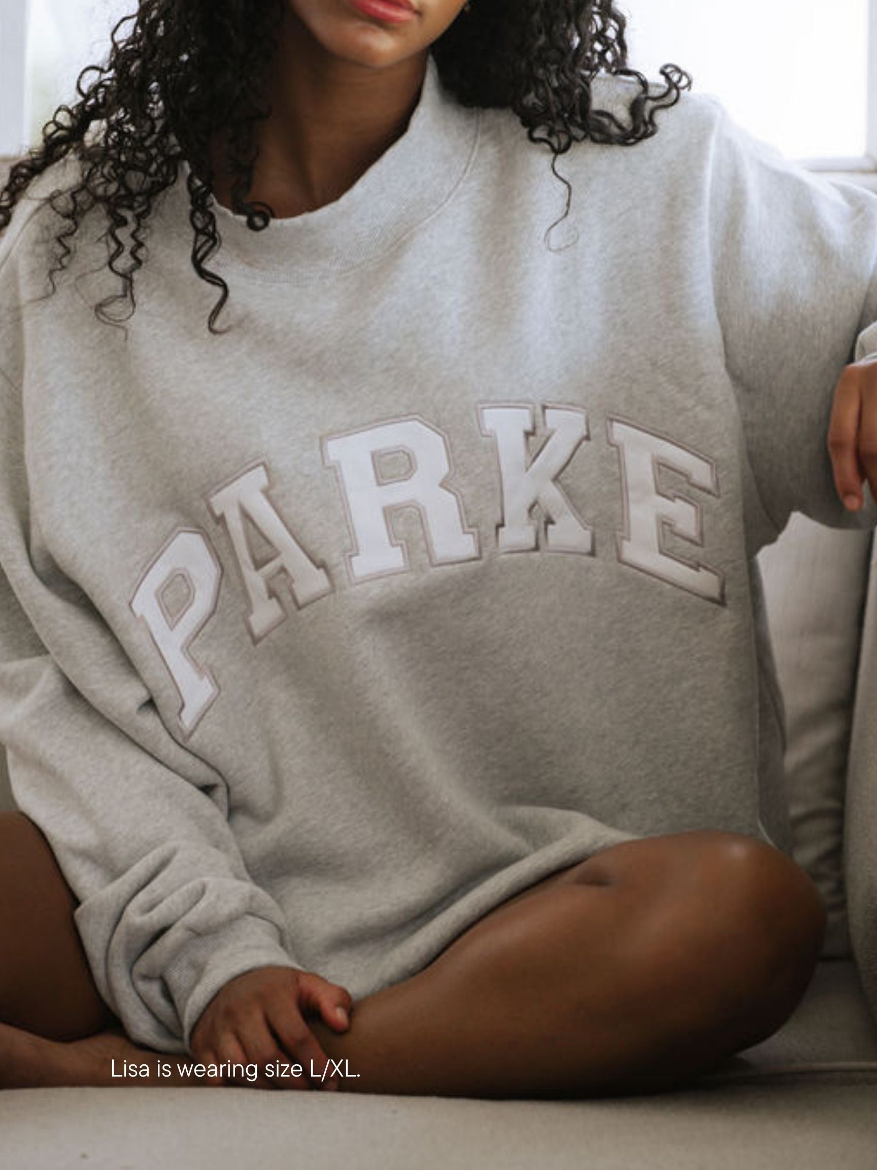 girl wearing varsity mockneck -classic grey + white