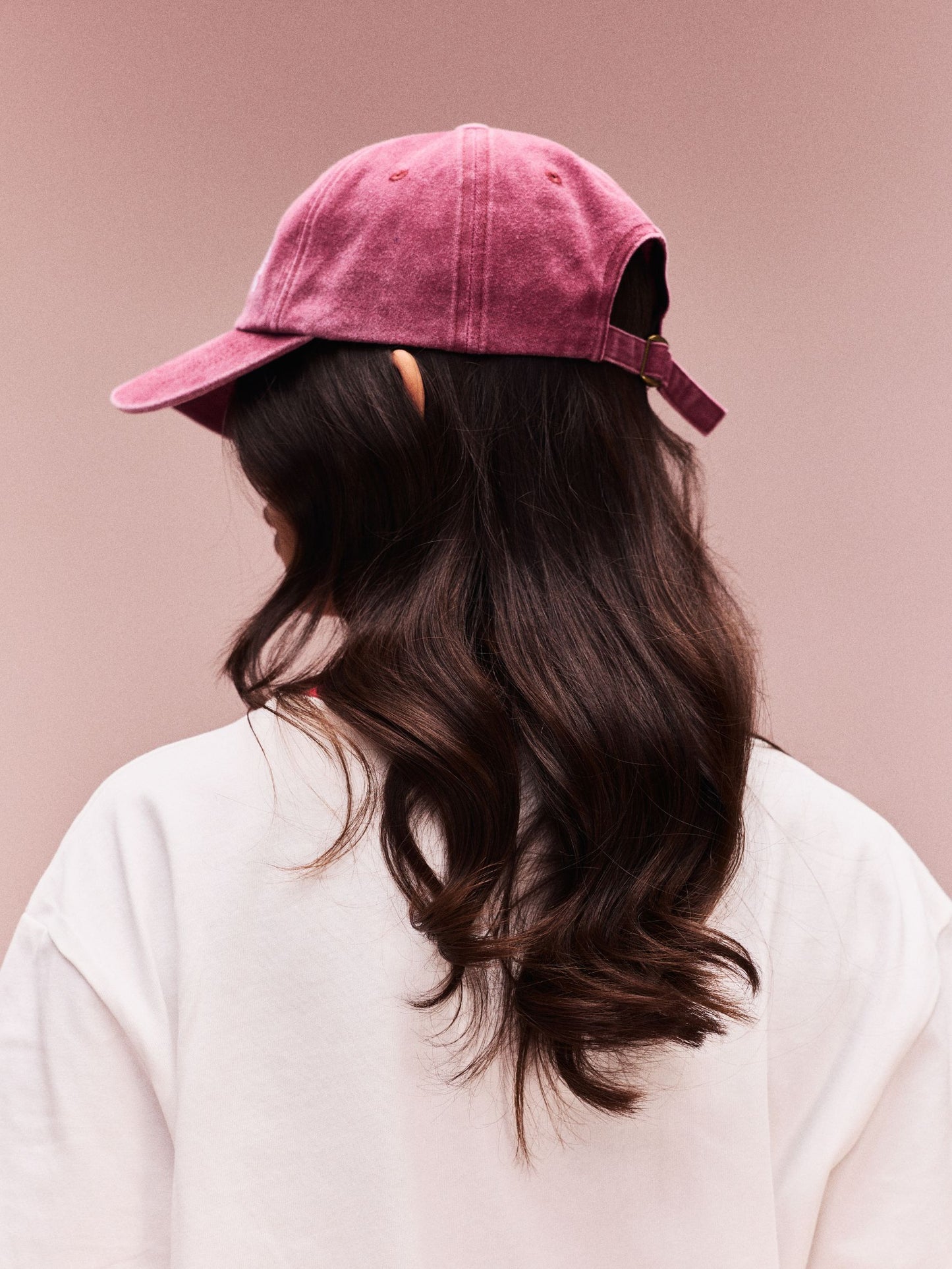 girl wearing Varsity Hat -washed red