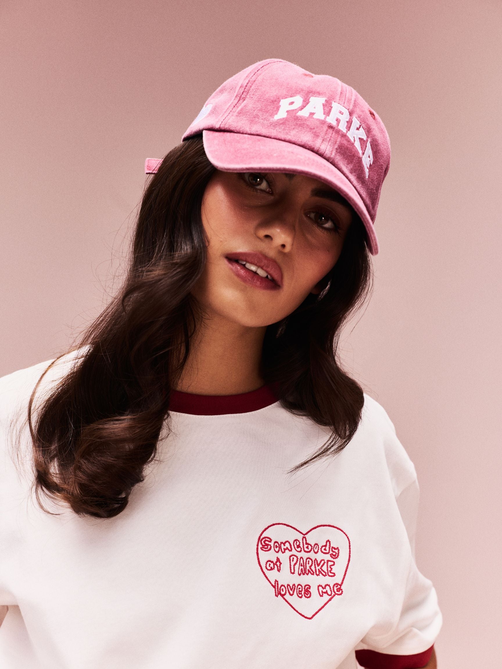 girl wearing Varsity Hat -washed red