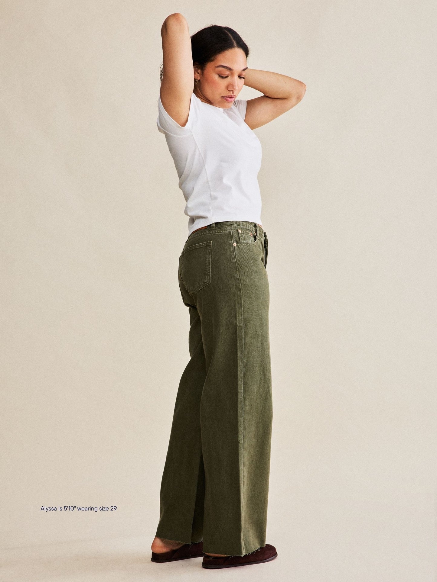 girl wearing low rise baggy jeans -olive