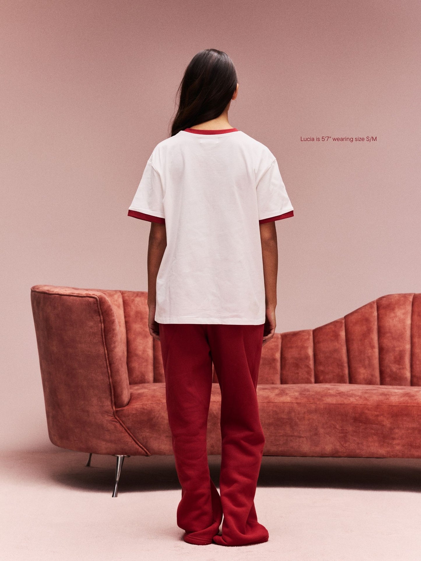 girl wearing Somebody Loves Me T-Shirt -white