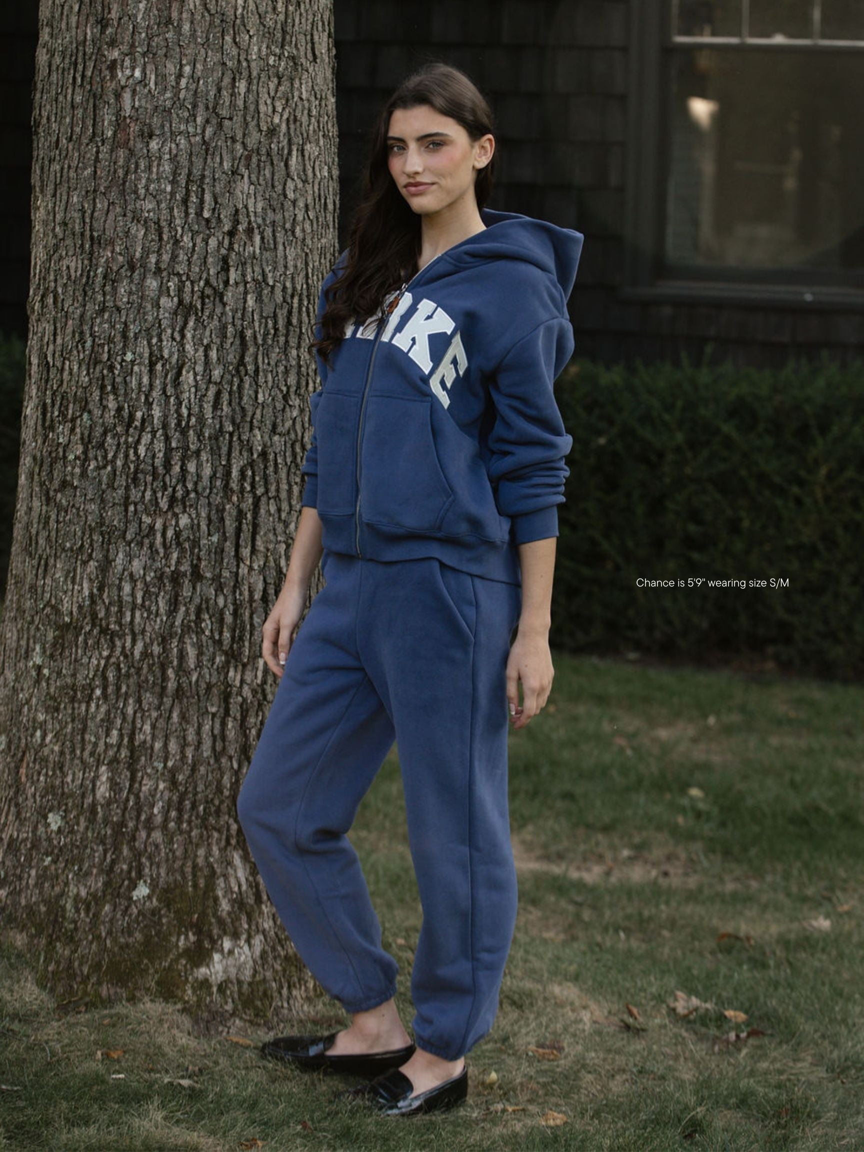 girl wearing Drawstring Unisex Sweats - crown blue