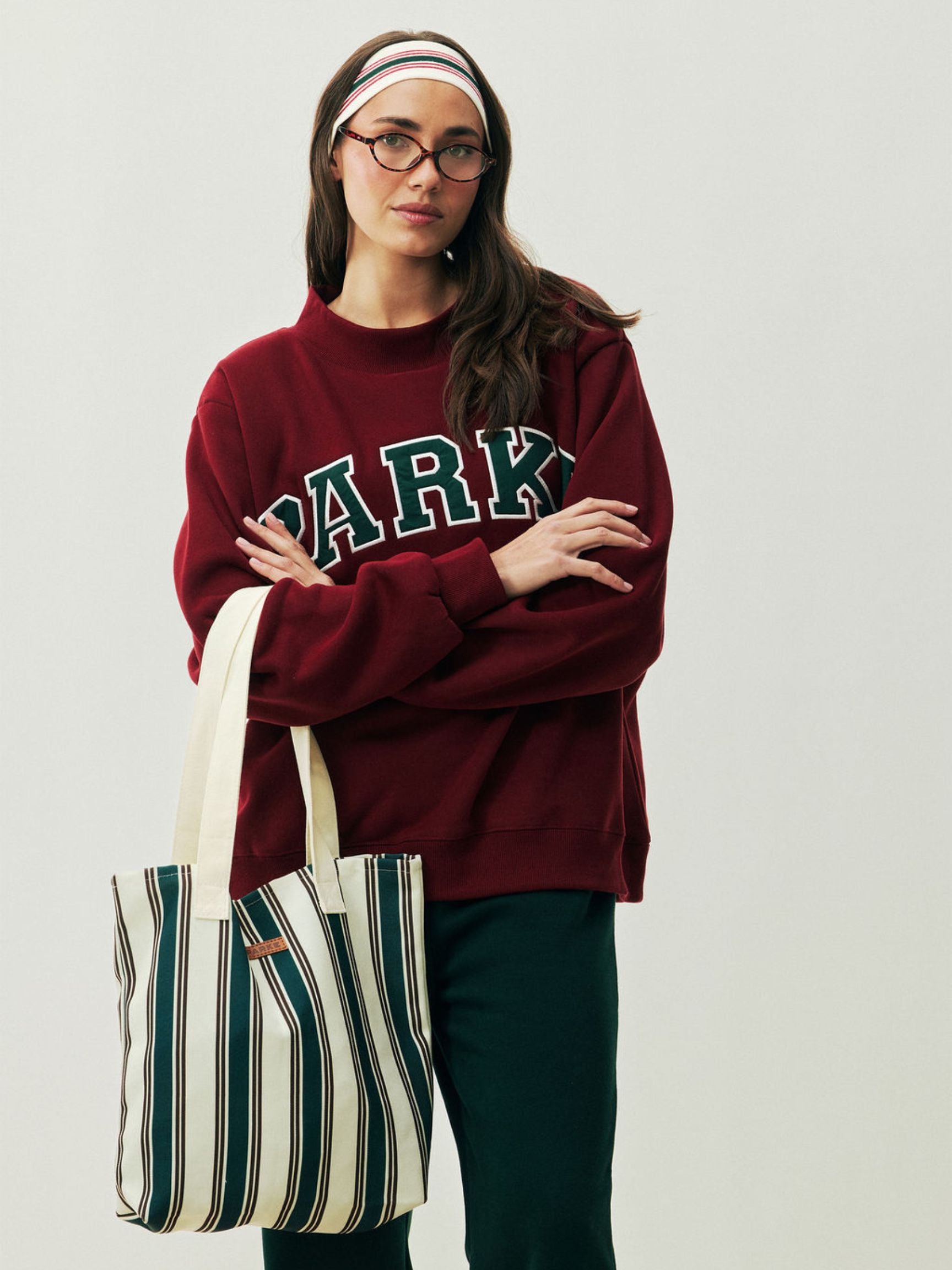 girl wearing Holiday Striped Tote -eggnog stripe