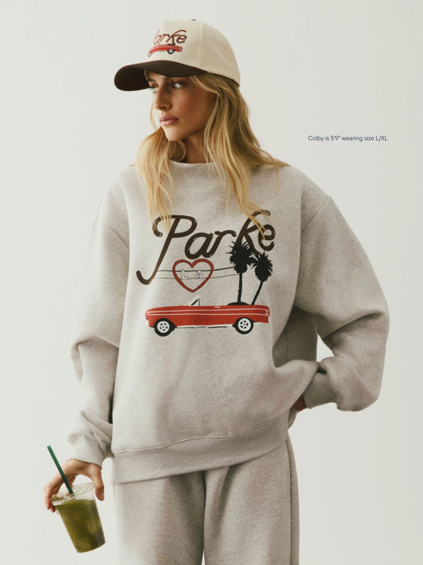girl wearing Cities Graphic Mockneck -los angeles