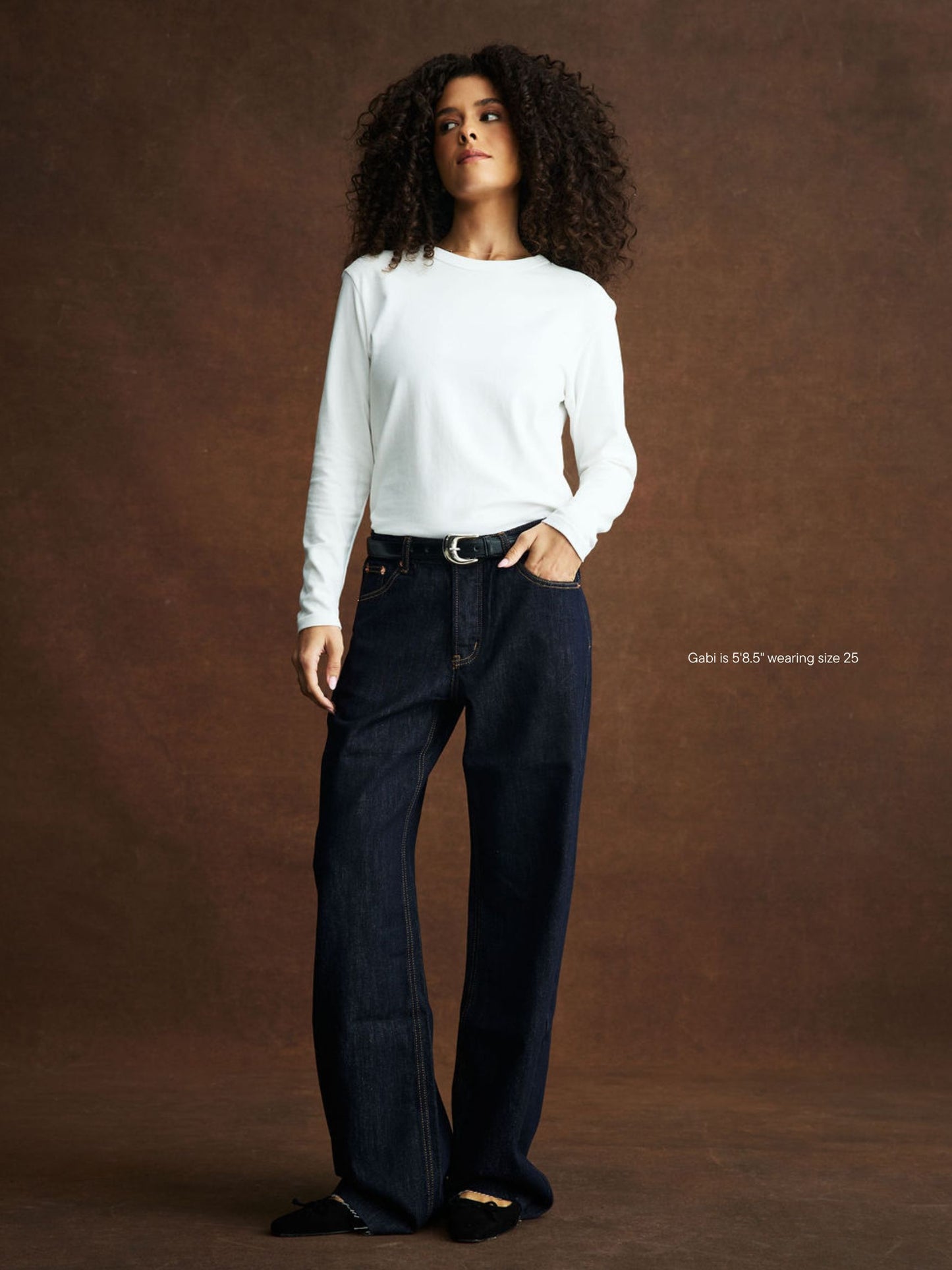 girl wearing Low Rise Baggy Jeans -dark wash