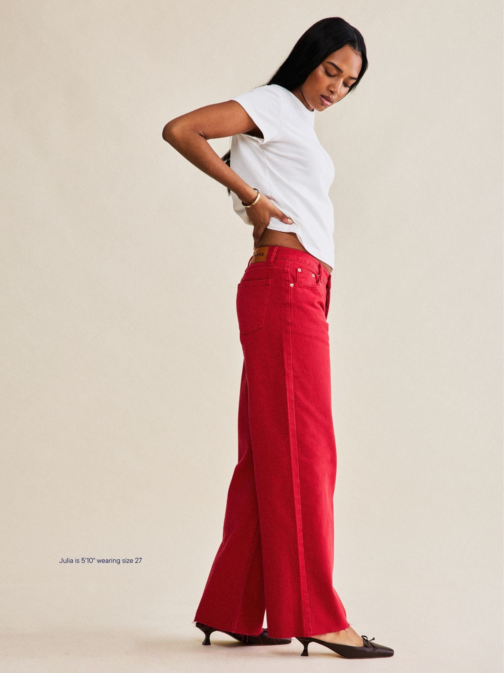 girl wearing low rise baggy jeans -washed red