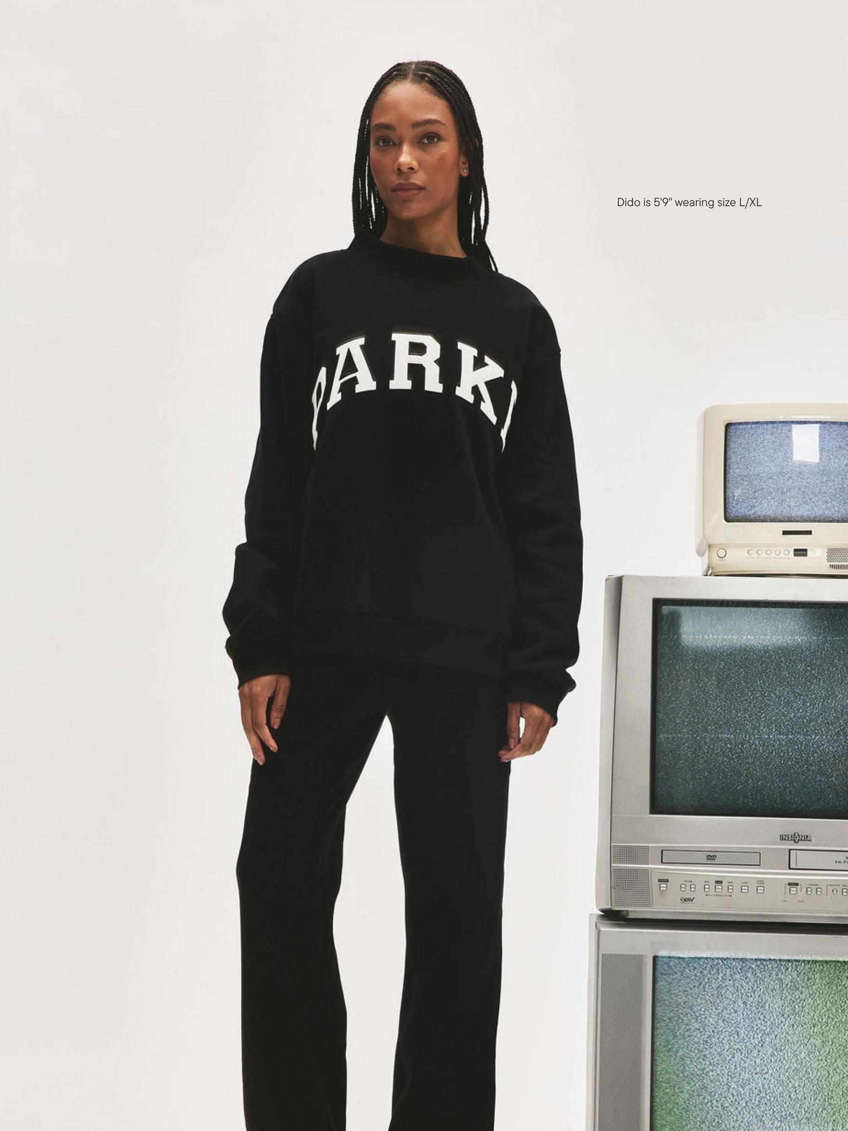 girl wearing Nostalgia Varsity Mockneck -black + white (black thread)