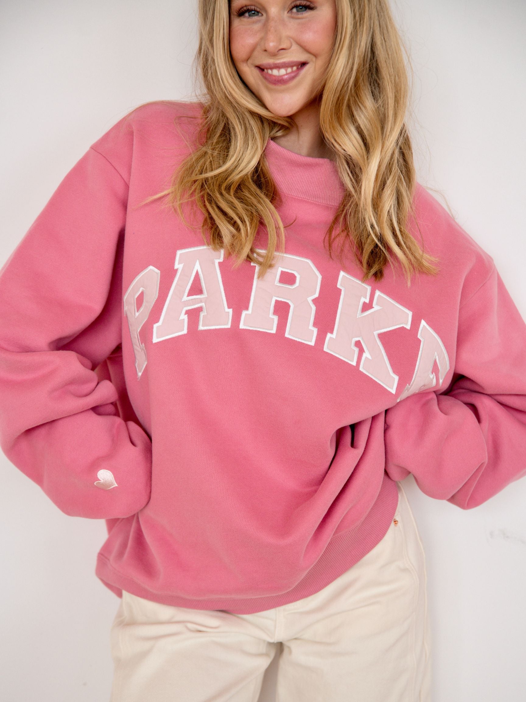 girl wearing Pink Aid Mockneck - pink aid pink