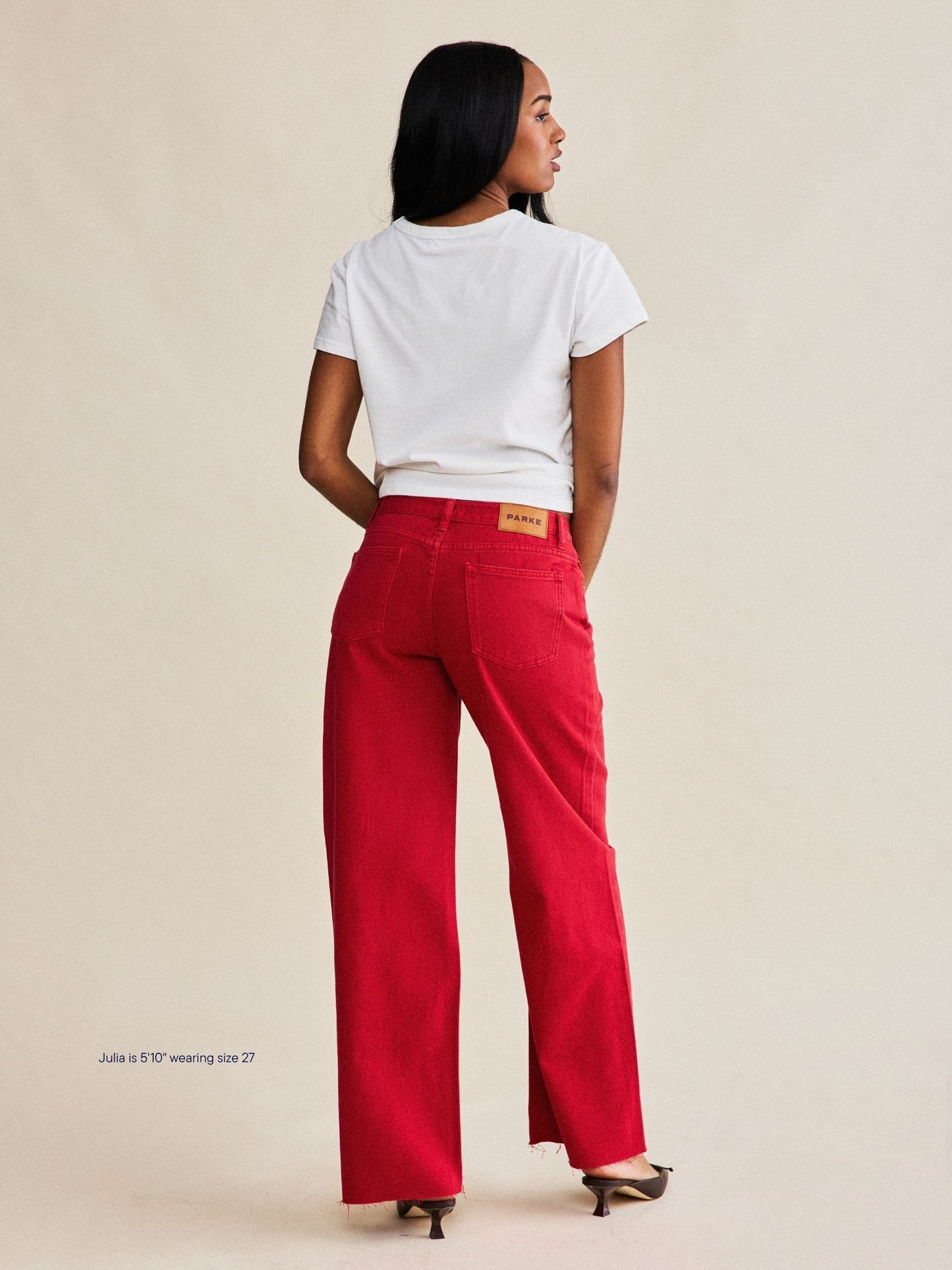 girl wearing low rise baggy jeans -washed red