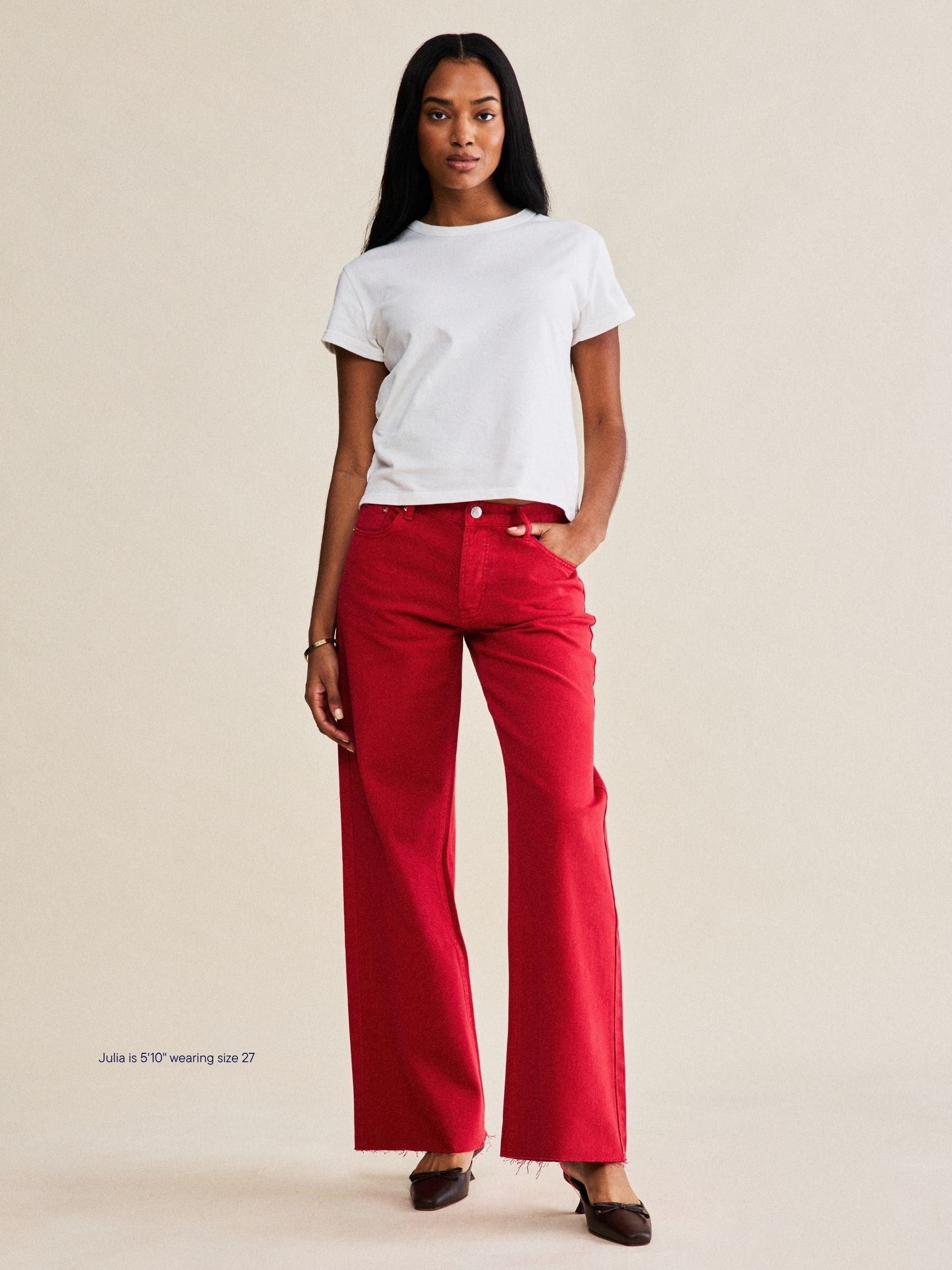 girl wearing low rise baggy jeans -washed red